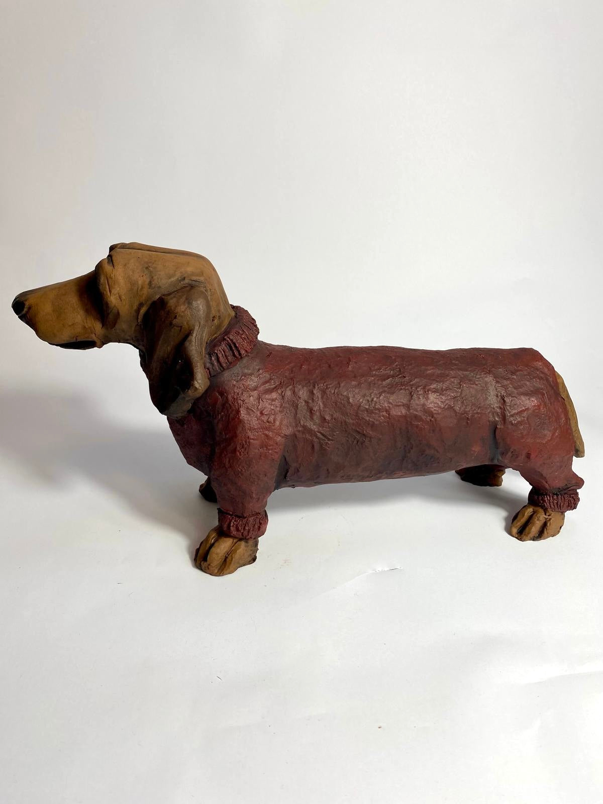 Dachshund in winter coat by Olivia Brown
