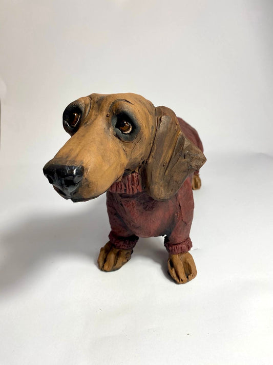 Dachshund in winter coat by Olivia Brown