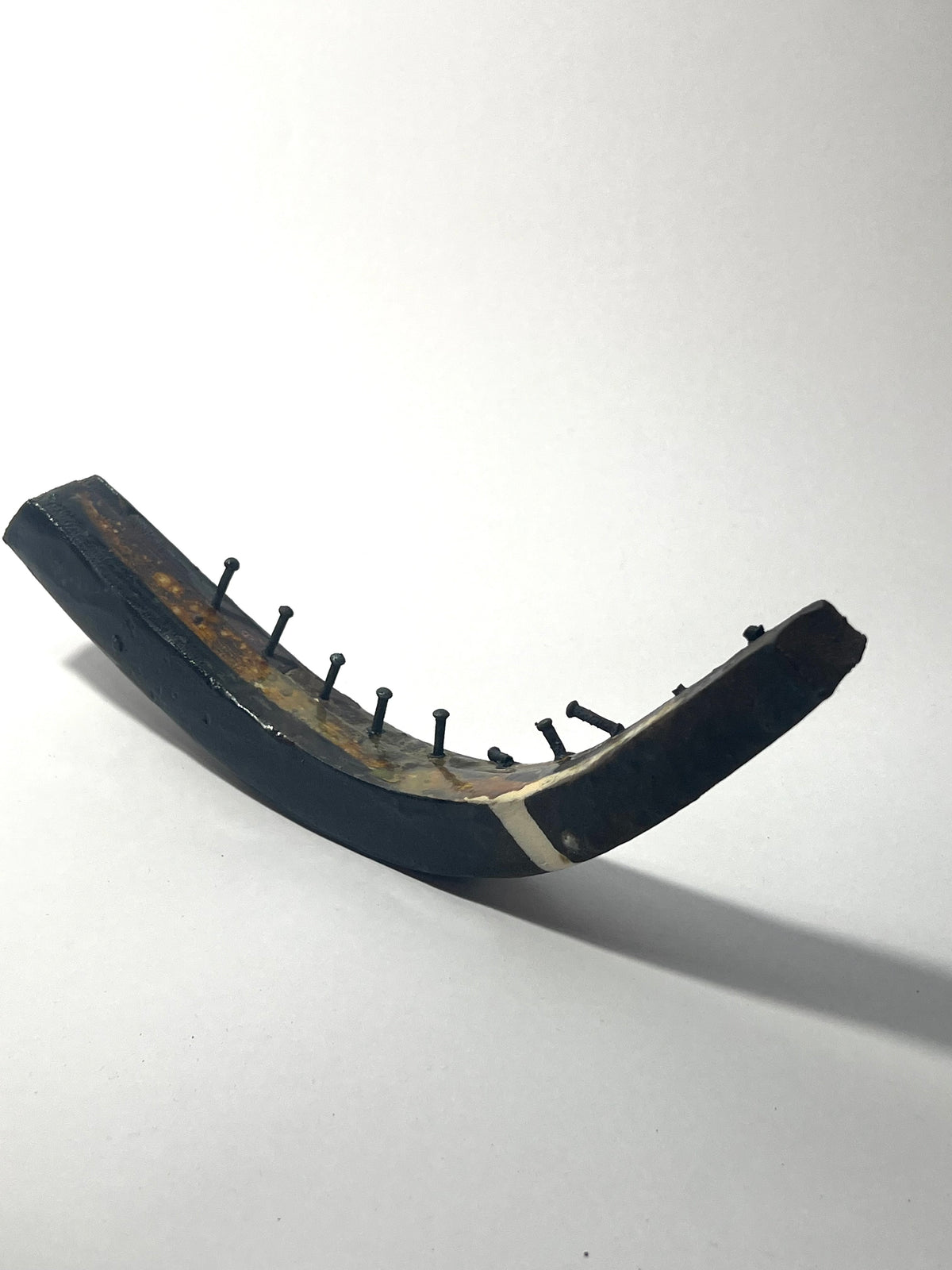 Small ceramic study with nails by Andrew Lawes