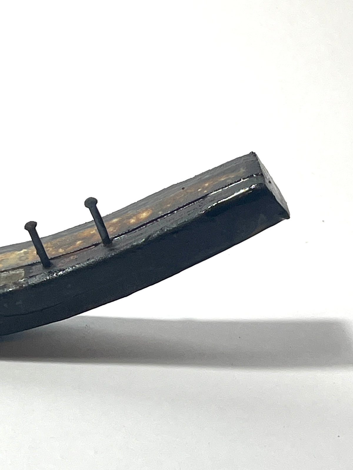 Small ceramic study with nails by Andrew Lawes