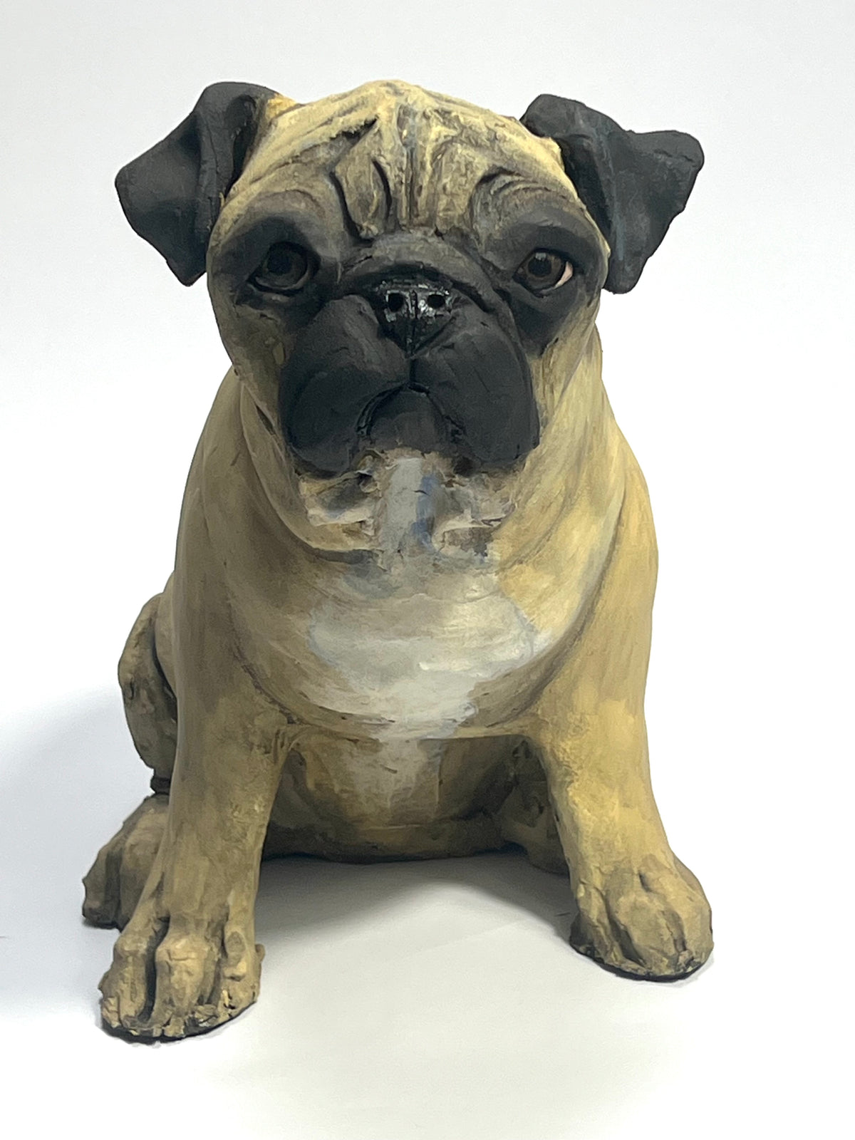 Ceramic pug sculpture by Olivia Brown