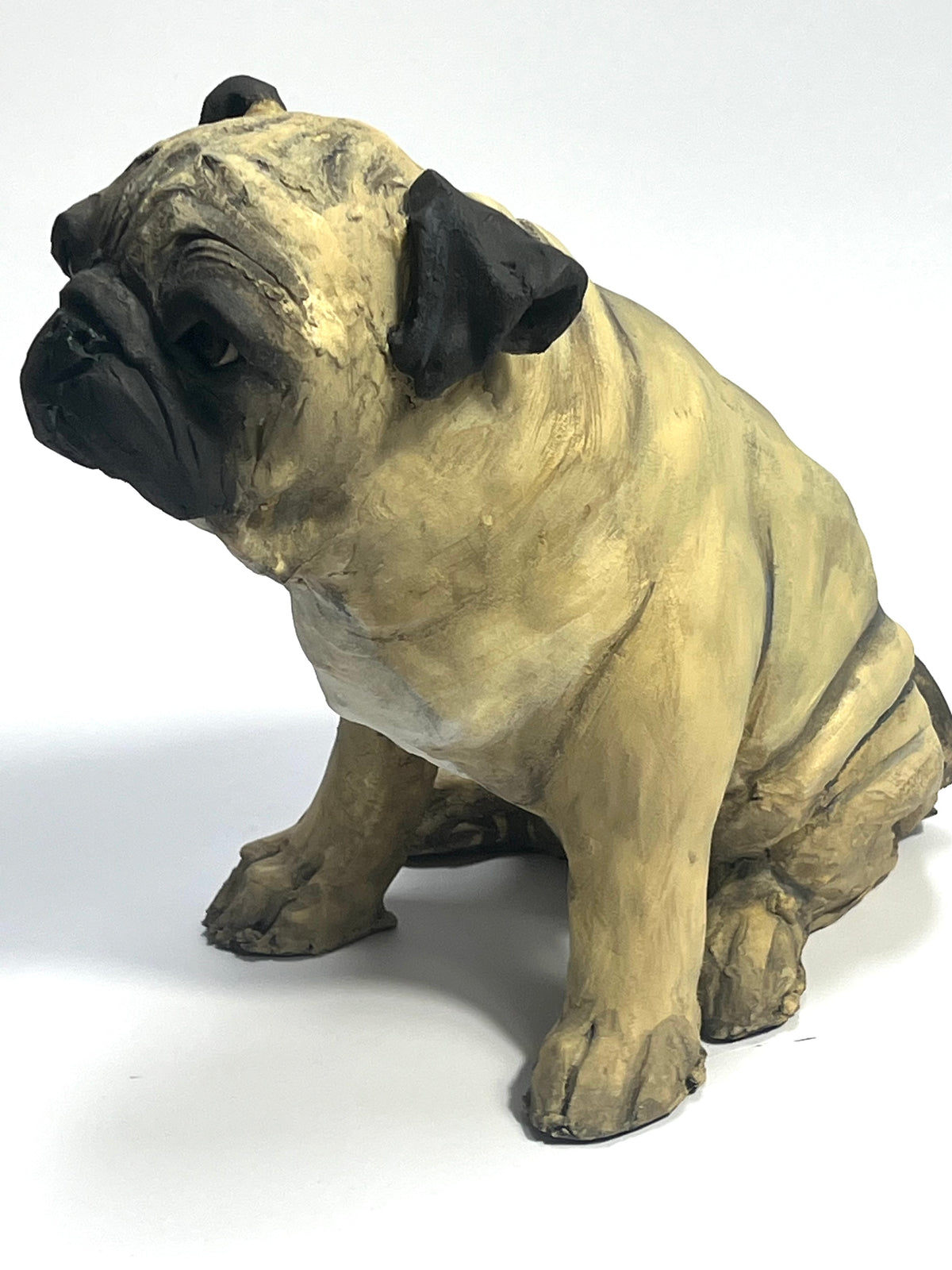 Ceramic pug sculpture by Olivia Brown