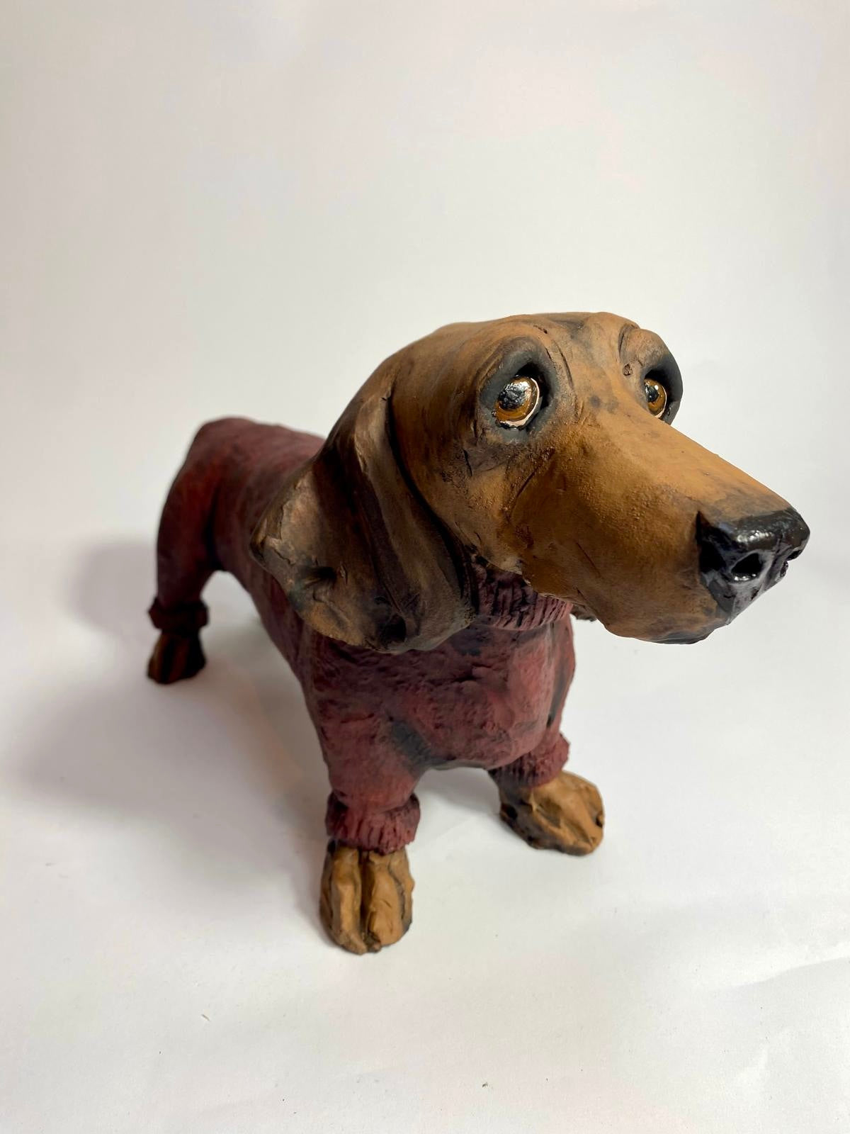 Dachshund in winter coat by Olivia Brown